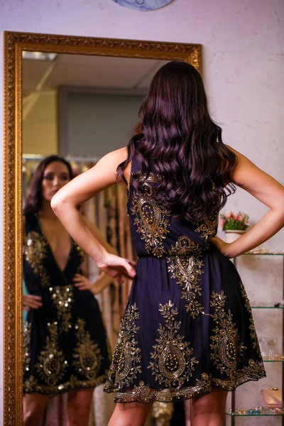 Young Woman Trying New Dress Showroom Fashion Choice Concept Brunette — Stock Photo, Image