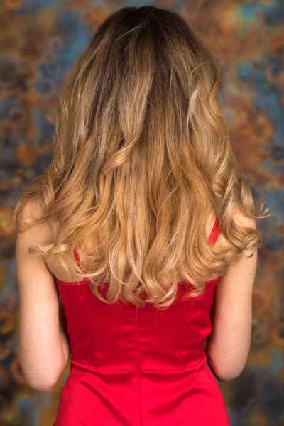 Female Long Wavy Blonde Hair Rear View Studio Wall Background — Stock Photo, Image