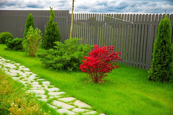 Beautiful garden in front of a villa house