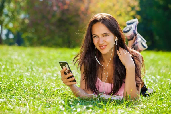 Young Beautiful Woman Dress Lies Green Grass Listens Music Headphones — Stock Photo, Image