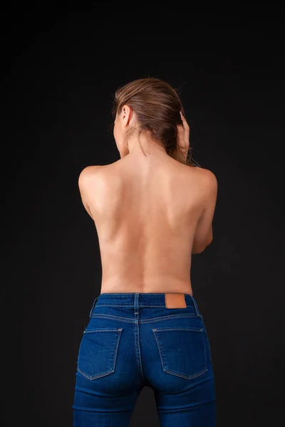 Back View Sexy Young Woman Denim Jeans Dark Wall Studio Royalty Free Stock Photos