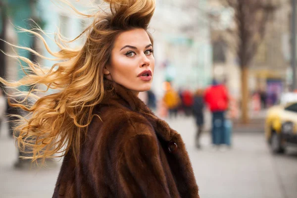 Happy Beautiful young blonde woman in mink fur coat — Stock Photo, Image