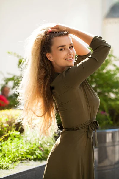 Close up portrait of beautiful young happy blonde woman in green dress, street summer outdoors — Stock Image Close Portrait Beautiful Young Happy Blonde Woman Green Dress Street Royalty Free Stock Photos