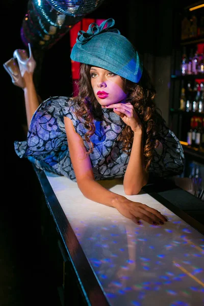 Young Beautiful Brunette Woman Designer Hat Blue Dress Background Disco — Stock Photo, Image