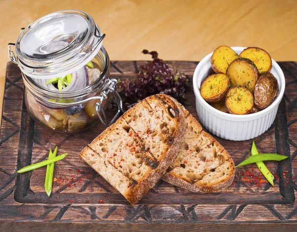 Marinated mackerel in a glass jar - snack under vodka — Stock Photo, Image