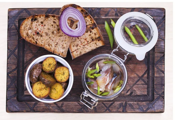 Marinated mackerel in a glass jar - snack under vodka — Stock Photo, Image