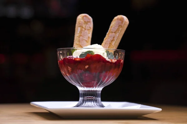 Creamer with strawberry ice cream — Stock Photo, Image