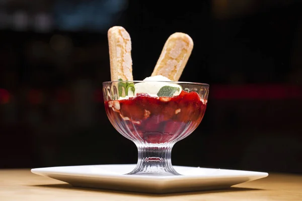 Creamer with strawberry ice cream — Stock Photo, Image