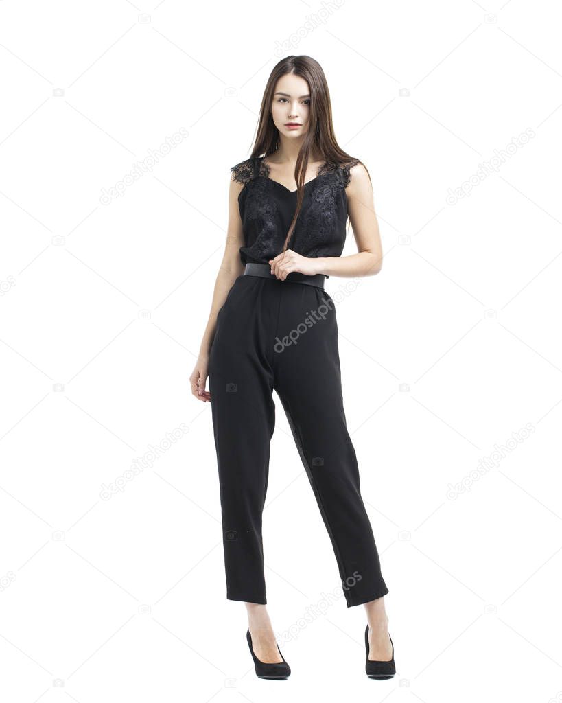 Full body, beautiful brunette woman in a black blouse and pants