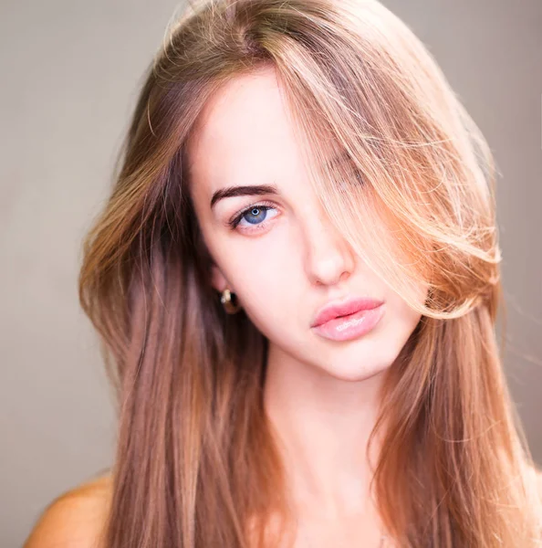 Portrait of a young beautiful blonde woman — Stock Photo, Image