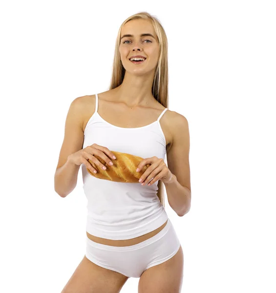 Young beautiful blonde woman in white fitness clothing — Stock Photo, Image