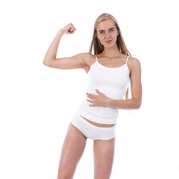 Young beautiful blonde woman in white fitness clothing — Stock Photo, Image