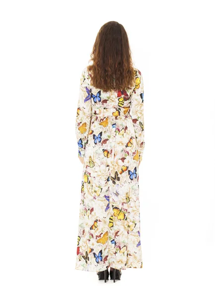 Full-length portrait of a woman in a long dress with butterflies — Stock Photo, Image