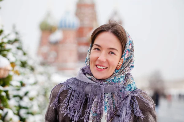 Young woman in fur mink coat on a red square in the center of Mo — Stock Photo, Image