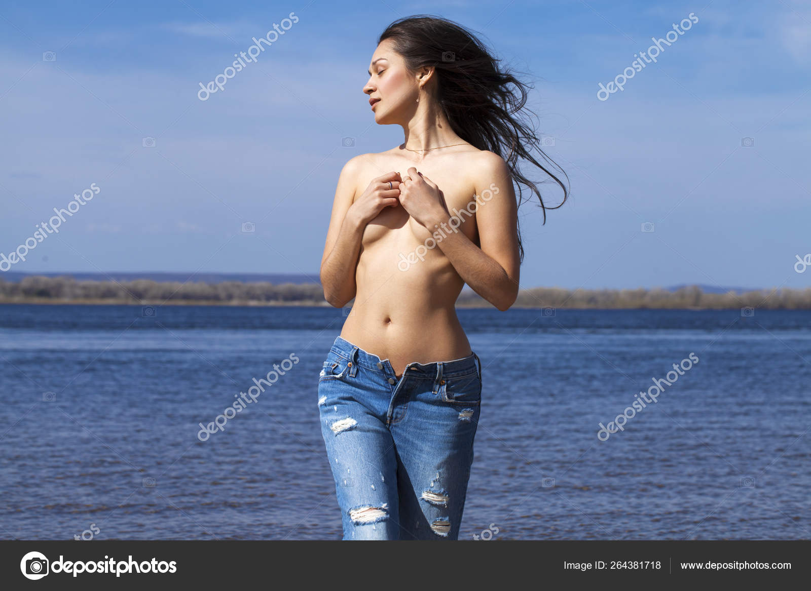 Topless Woman Doing Yoga In The Nature Near A River Stock Photo