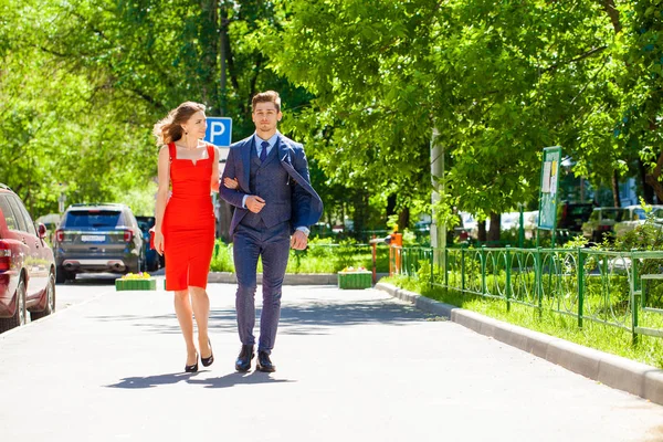 Young couple or european woman and man walking on city street — 스톡 사진