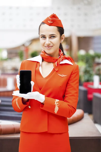 RUSSIA, MOSCOW: 28 JUNE 2019. Beautiful stewardess dressed in of — Stock Photo, Image