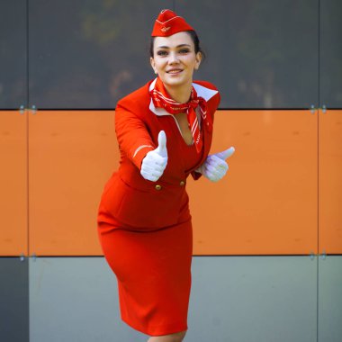 RUSSIA, SAMARA: 08 AUGUST 2019. Sexy stewardess dressed in offic