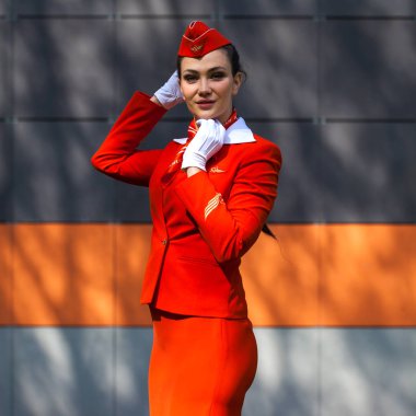 RUSSIA, SAMARA: 08 AUGUST 2019. Sexy stewardess dressed in offic