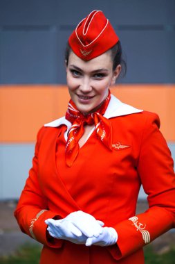 RUSSIA, SAMARA: 08 AUGUST 2019. Sexy stewardess dressed in offic