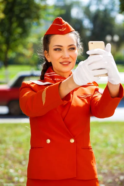 RUSSIA, SAMARA: 08 AUGUST 2019. Sexy stewardess dressed in offic — Stock Photo, Image