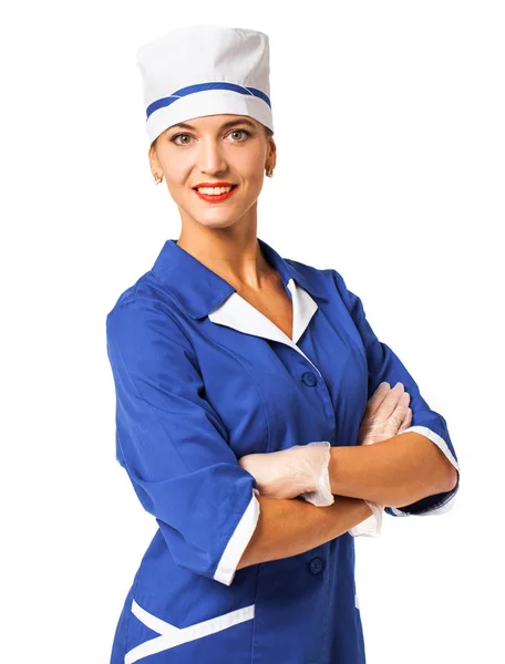 Mooie verpleegster in een blauw pak geïsoleerd op witte achtergrond — Stockfoto