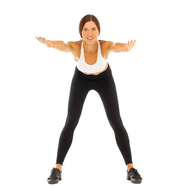 Young healthy girl doing exercises, full length portrait isolate — Stock Photo, Image