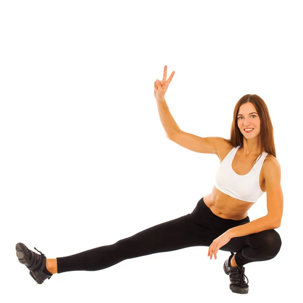 Sexy Fitness Frau posiert im Studio - isoliert auf einem weißen Backgr — Stockfoto