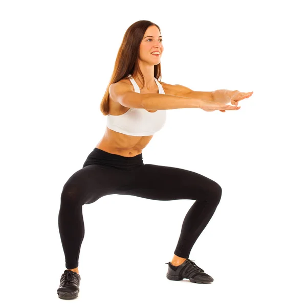 Sexy fitness woman posing in studio - isolated on a white backgr — Stock Photo, Image