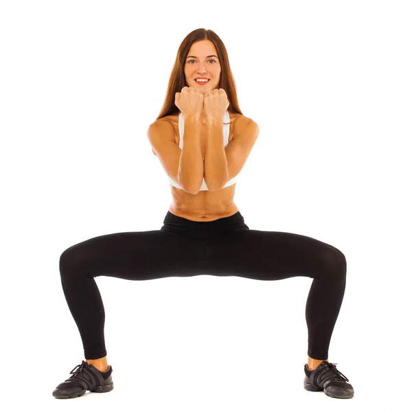 Mulher fitness sexy posando em estúdio isolado em um backgr branco — Fotografia de Stock