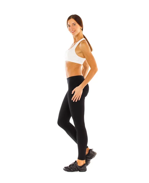 Sexy fitness kobieta pozowanie w studio - odizolowany na a biały backgr — Zdjęcie stockowe