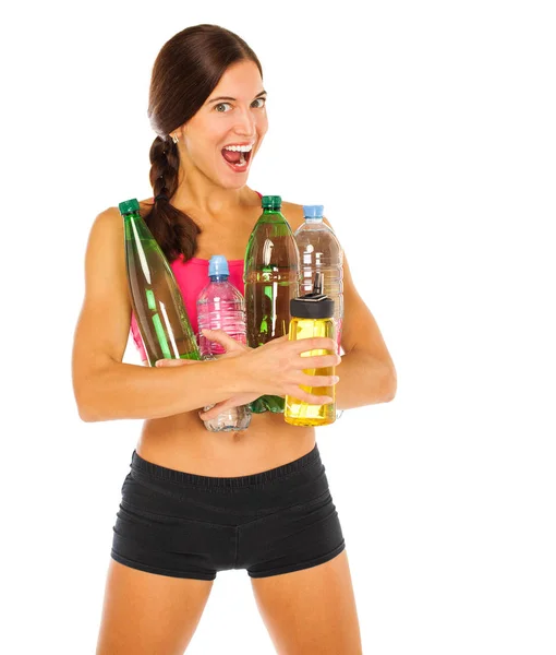 Fiatal atlétikai modell, amely sok vizes palackot tart — Stock Fotó