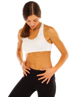 Beyaz bir arka plan üzerinde izole düz bir mide ile Fitness modeli