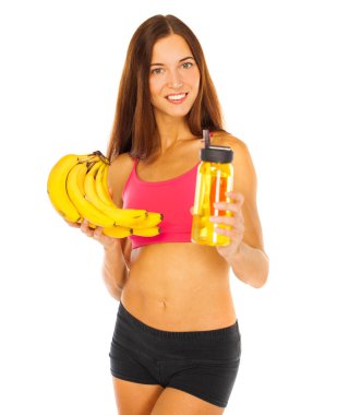 Beyaz arka planda izole edilmiş muzları olan güzel genç bir model.