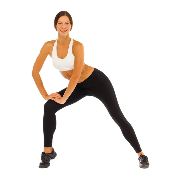 Young healthy girl doing exercises, full length portrait isolate — Stock Photo, Image