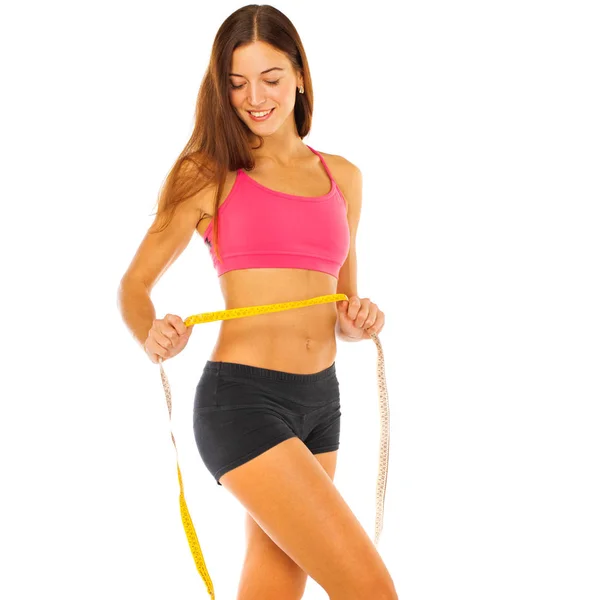 Beyaz bir arka plan üzerinde izole düz bir mide ile Fitness modeli — Stok fotoğraf