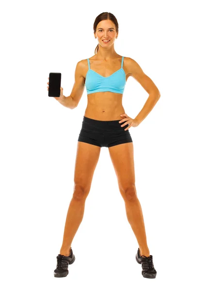 Joyeux jeune femme de remise en forme montrant écran blanc smartphone iso — Photo