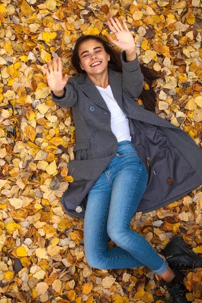 Top view portrait of a young beautiful woman in a white sweater — Stock Photo, Image