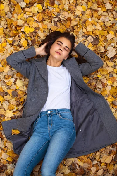 Top view portrait of a young beautiful woman in a white sweater — Stock Photo, Image