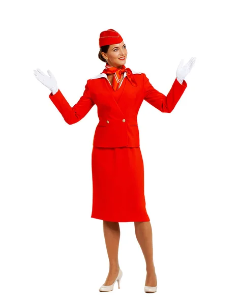 Mladá krásná ruská letuška v červené uniformě — Stock fotografie