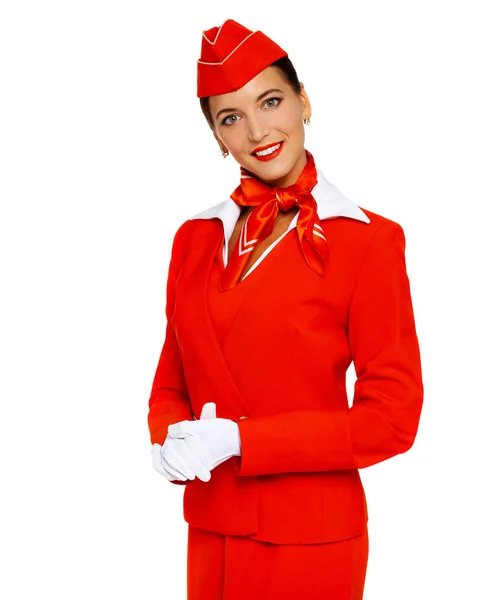 身穿红色制服的年轻漂亮的俄罗斯空姐 — 图库照片