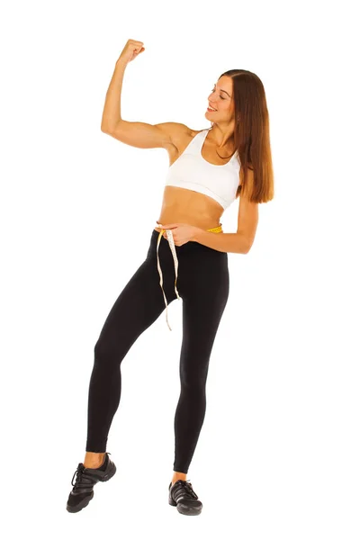 Joven chica sana haciendo ejercicios, retrato de cuerpo entero aislado — Foto de Stock