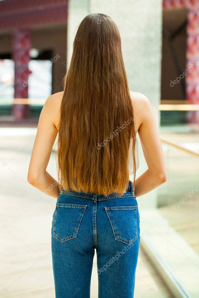 Back rear view brunette hair model, indoor