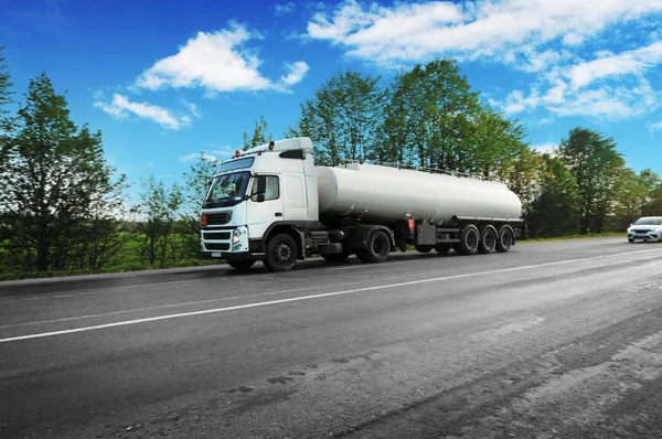 Big Metal Fuel Tanker Truck Shipping Fuel Countryside Road Trees Stock Picture