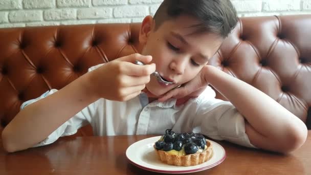 Young Woman Eating the blackberry Cake — Stock Video