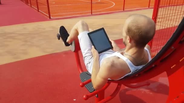 Man Tablet Computer Workout — Stock Video