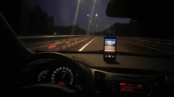 Night traffic with car dashboard — Stock Photo, Image