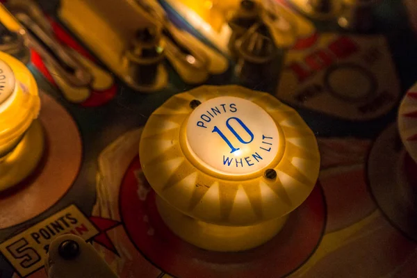 Pinball table close-view of vintage game machine — стоковое фото