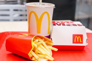 Moscow, Russia, March 15 2018: McDonalds Big Mac hamburger menu, French Fries and Coca Cola clipart