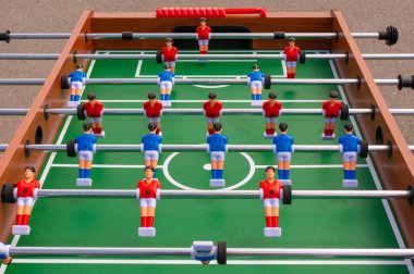 Table football game, Soccer table with red and blue players clipart